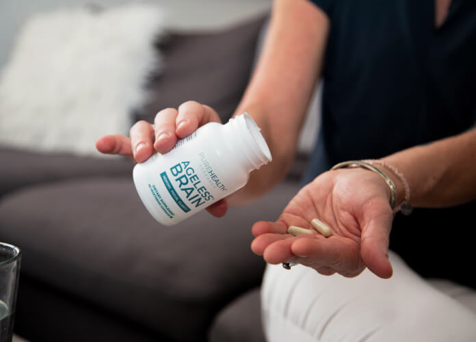 Ageless Brain product in hand